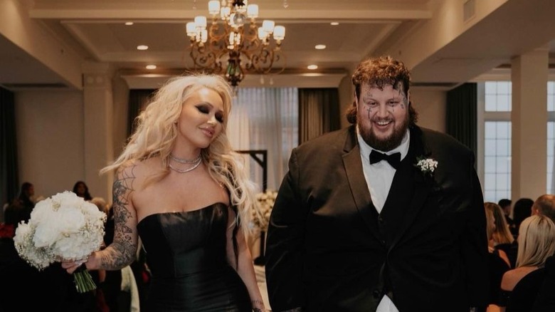 Jelly Roll and Bunnie Xo walk down the aisle