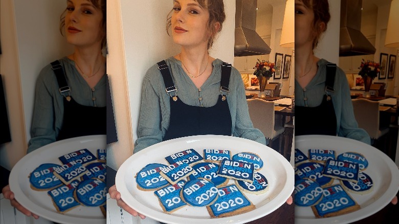 Taylor Swift holding plate of cookies