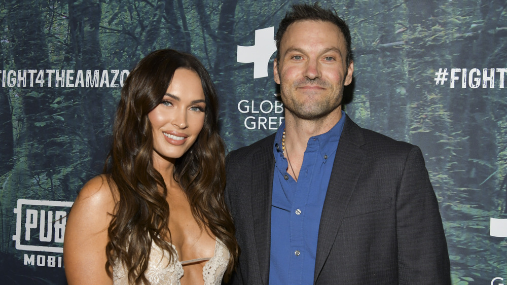 Megan Fox and Brian Austin Green posing arm in arm