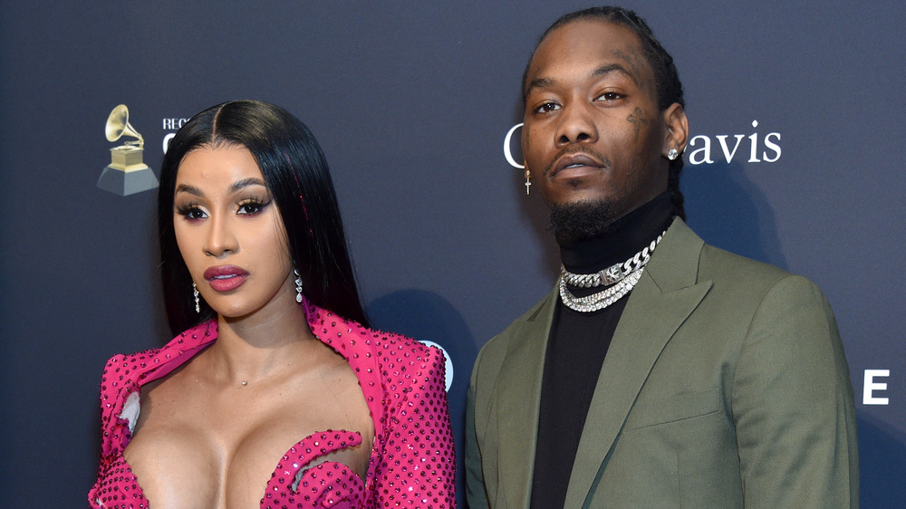 Cardi B and Offset posing with serious expressions