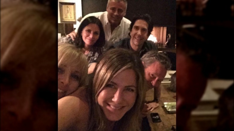 Cast of Friends taking selfie