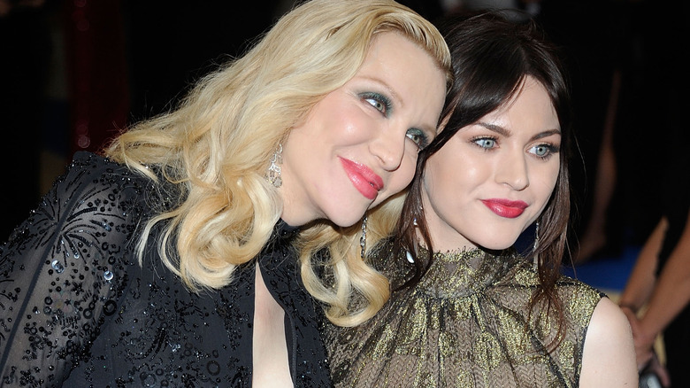 Courtney Love and Francis Bean Cobain posing