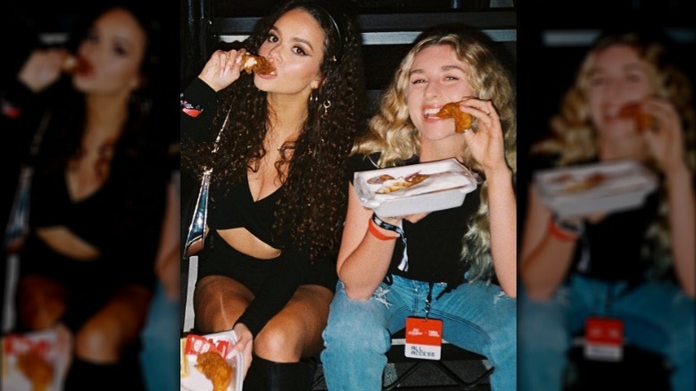 Madison Pettis and Courtney Taylor Olsen eating