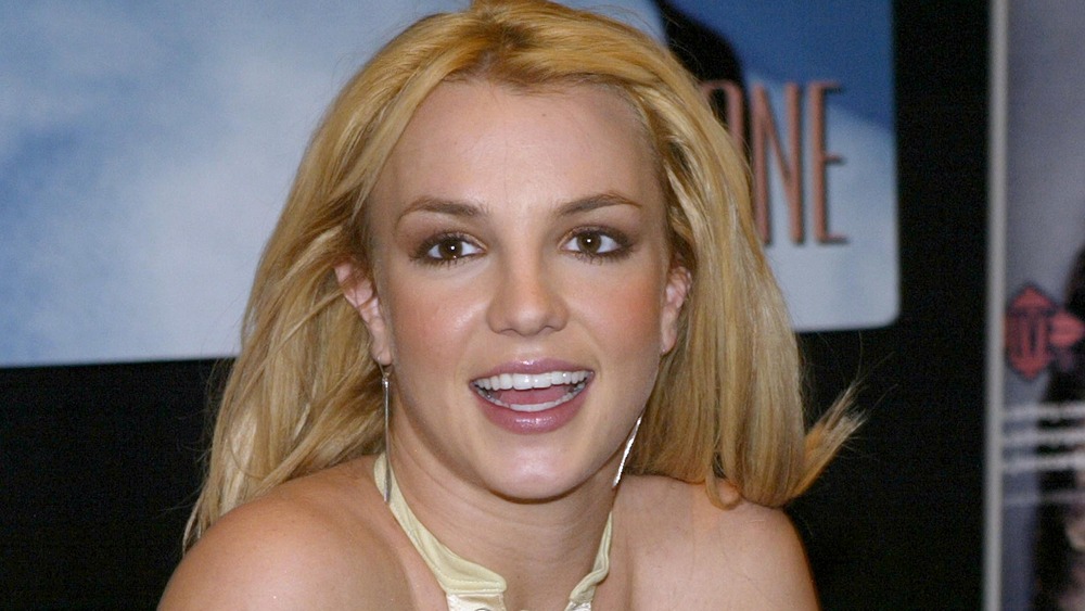 Britney Spears smiling Planet Hollywood NYC in 2003