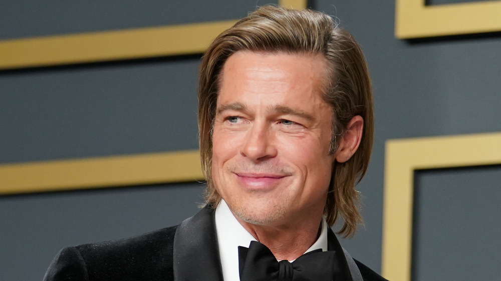 Brad Pitt smiling at the 2020 Oscars