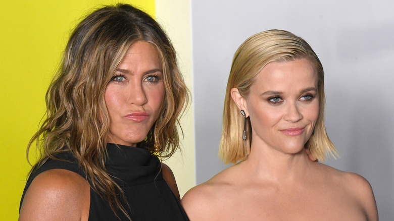 Jennifer Aniston and Reese Witherspoon pulling faces