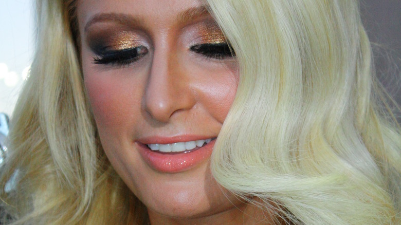 Paris Hilton looking down