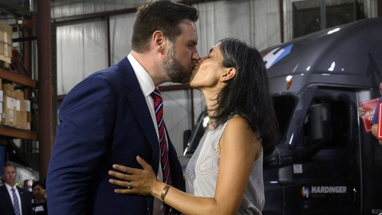 JD Vance kisses wife Usha Vance at a rally in Erie