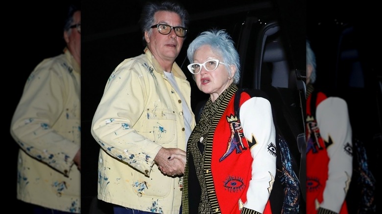 Cyndi Lauper and David Thornton holding hands