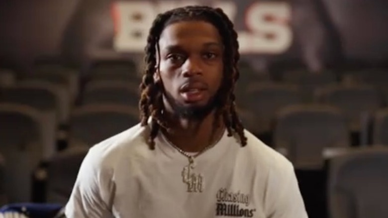 Damar Hamlin seated in a stadium chair