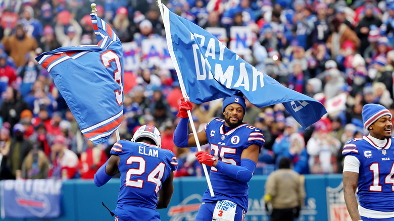 Buffalo Bills waving flags on the field 