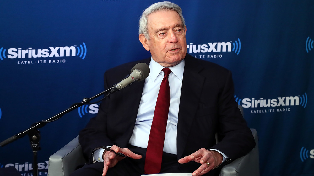 Dan Rather talking with microphone Sirius XM