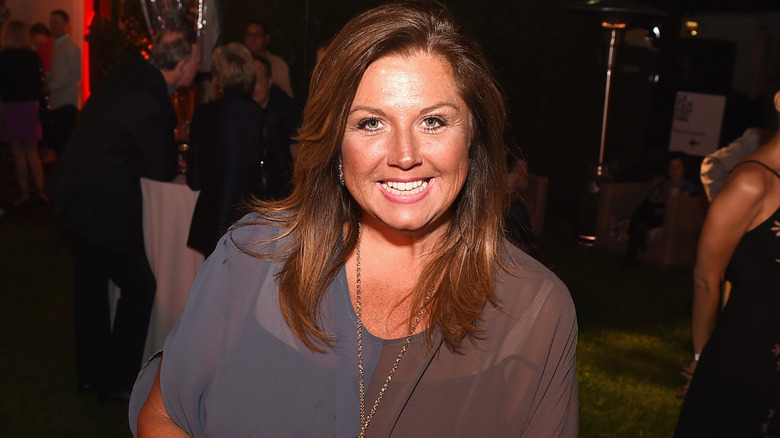 Abby Lee Miller smiling