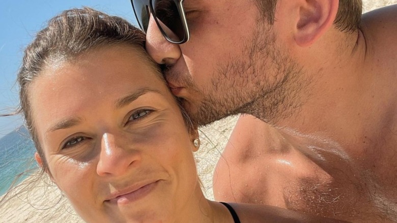 Danica Patrick and Carter Comstock at the beach