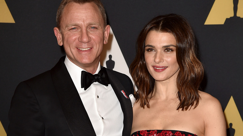 Daniel Craig smiling with Rachel Weisz