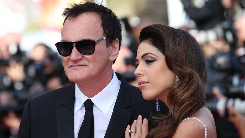 US film director Quentin Tarantino (L) and his wife Israeli singer Daniella Pick arrive for the screening of the film "Once Upon a Time... in Hollywood" at the 72nd edition of the Cannes Film Festival