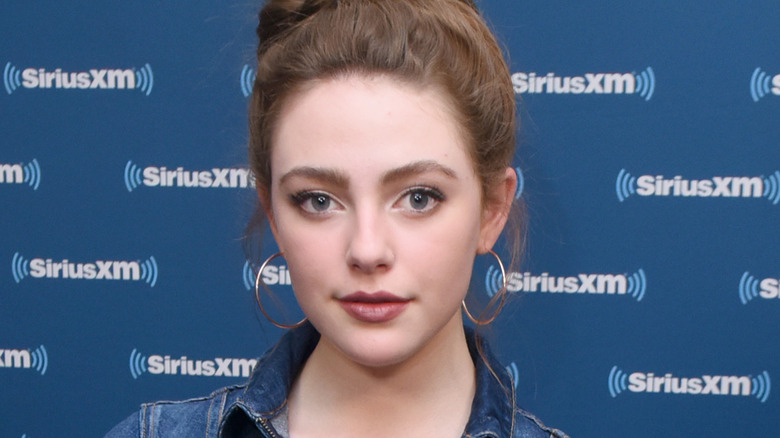 Danielle Rose Russell posing for cameras