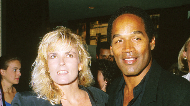 Nicole Brown and O.J. Simpson pose together