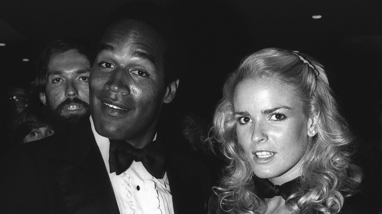 Nicole Brown and O.J. Simpson pose together