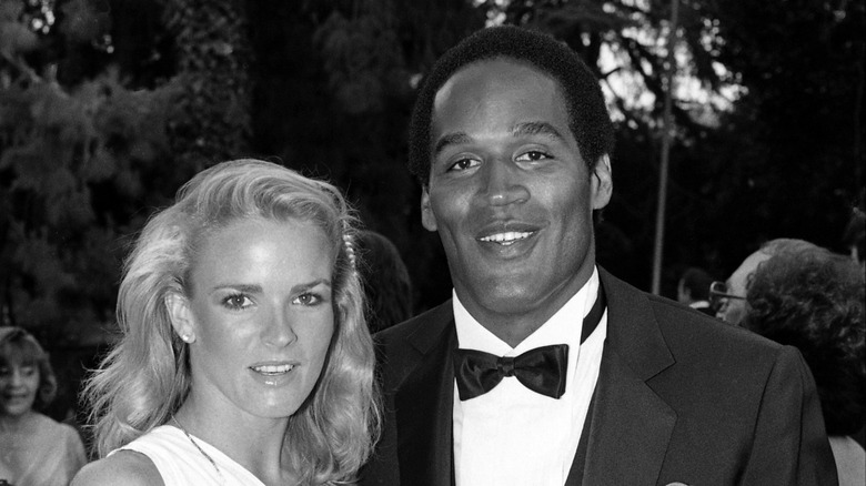 Nicole Brown and O.J. Simpson pose together