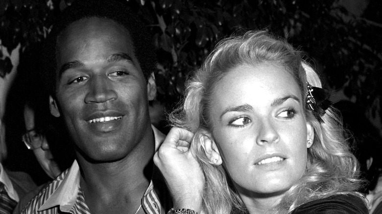 Nicole Brown and O.J. Simpson pose together