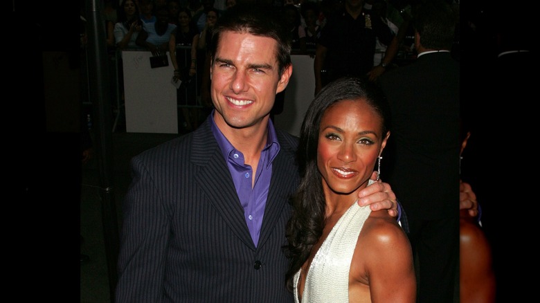 Tom Cruise with arm around Jada Pinkett Smith