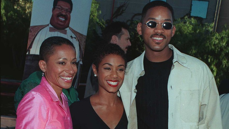 Jada Pinkett Smith posing with her mom and husband