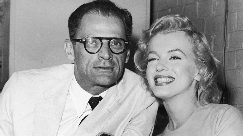 Arthur Miller and Marilyn Monroe smiling