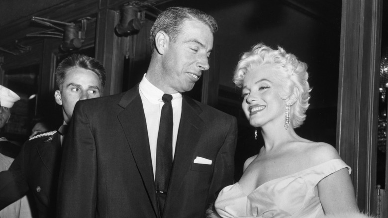 Joe DiMaggio and Marilyn Monroe smiling