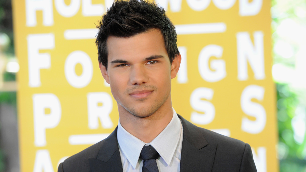 Taylor Lautner grinning