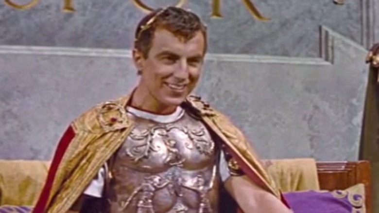 Jay Robinson as Caligula, smiling