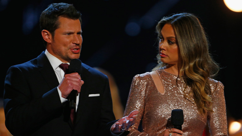 Nick and Vanessa Lachey on stage of Miss USA