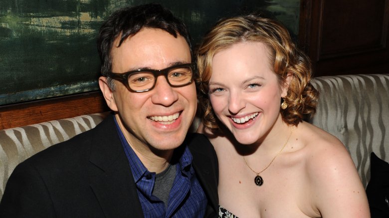 Fred Armisen smiling with Elizabeth Moss