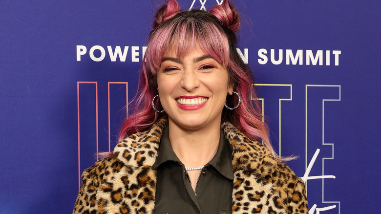 Melissa Villaseñor smiling in leopard print