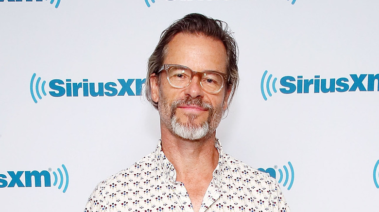 Guy Pearce in white shirt 