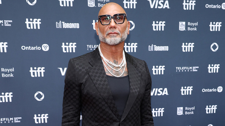 Dave Bautista wearing pearl necklaces