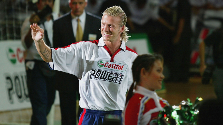 David Beckham waving on the field for Real Madrid