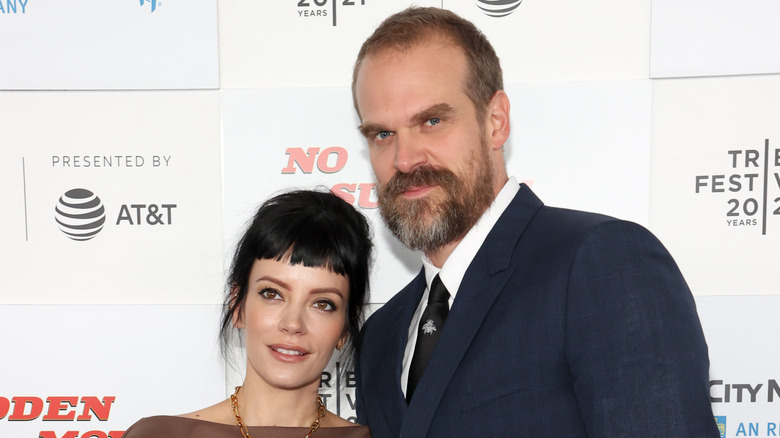 Lily Allen and David Harbour posing on the red carpet