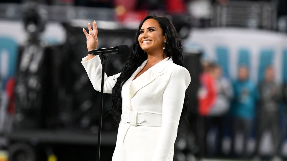 Demi Lovato waving Super Bowl