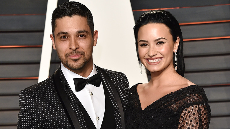 Demi Lovato and Wilmer Valderrama pose 