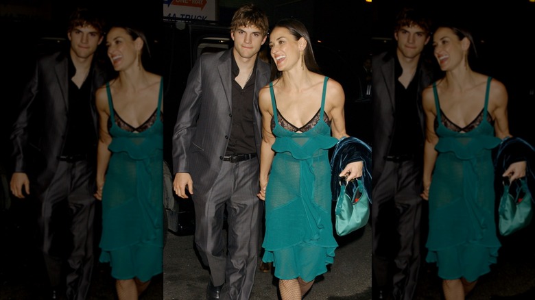 Demi Moore holding hands with Ashton Kutcher