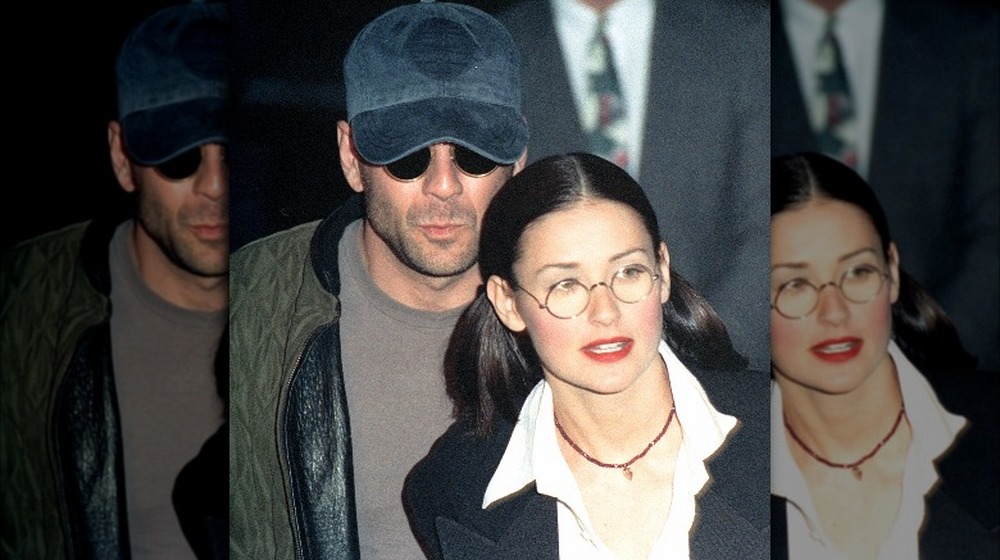 Bruce Willis and Demi Moore at a movie premiere