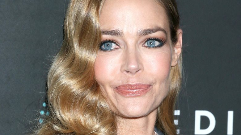 Denise Richards posing on the red carpet