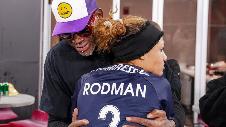 Dennis Rodman and Trinity Rodman embrace