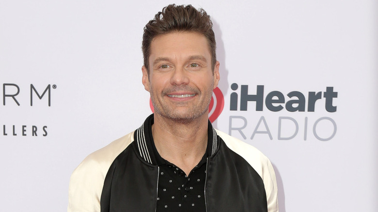 Ryan Seacrest black and white jacket