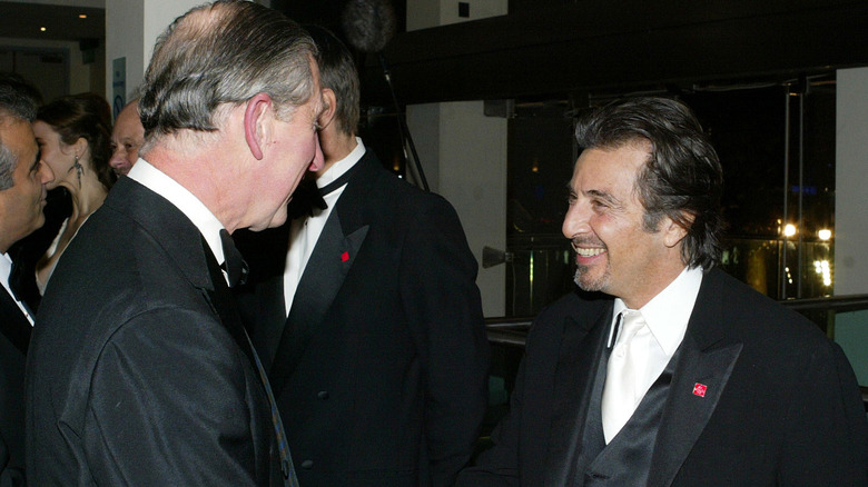 King Charles shakes hands with Al Pacino