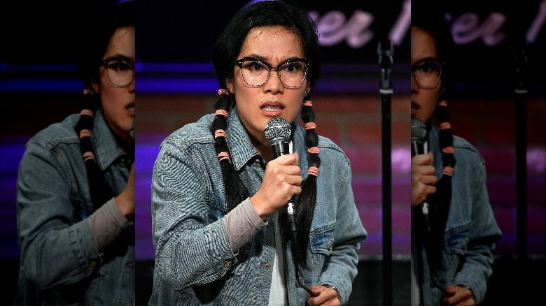 Ali Wong performing in pigtails