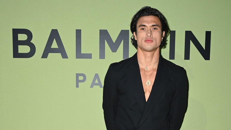 Charles Melton at a Balmain fashion show