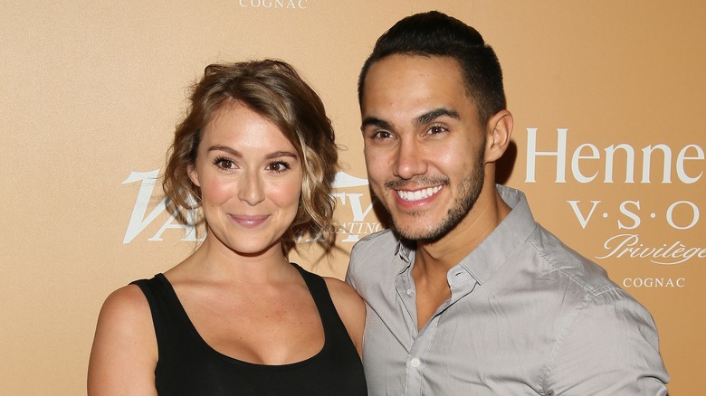 Alexa and Carlos PenaVega smiling