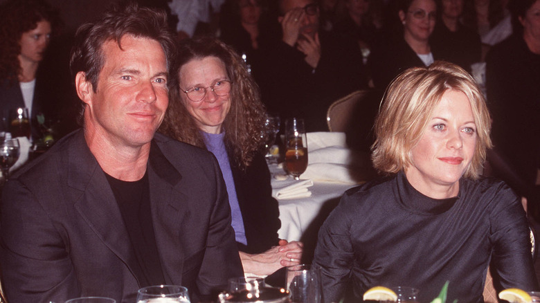 Dennis Quaid and Meg Ryan wearing black outfits